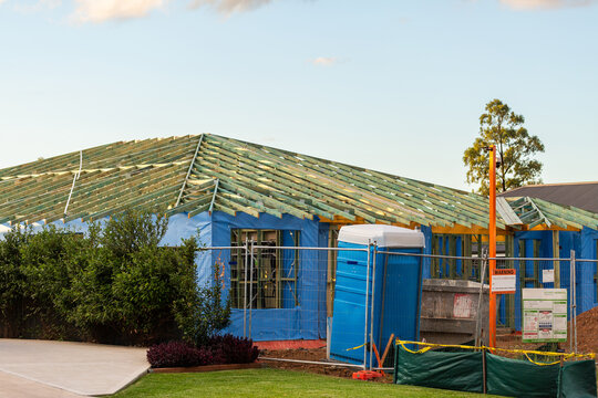 portaloo and security camera on house build construction site