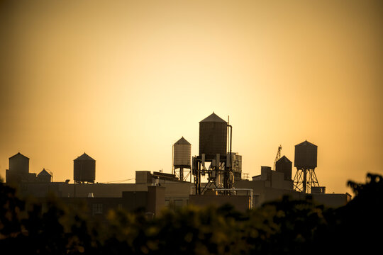 USA, New York City, Old water tanks on rooftops in East Village