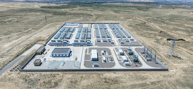 Aerial View of a Large-Scale Battery Energy Storage Station in the Gobi Desert with Grid Infrastructure