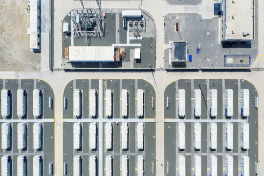 High-Altitude Top-Down View of a Utility-Scale Battery Energy Storage Plant with Substation and Control Infrastructure