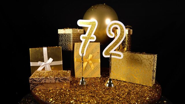 Gold Number 72 with Gold Glitter Confetti Sparkles with Gifts and Balloons for Party Seventy Two