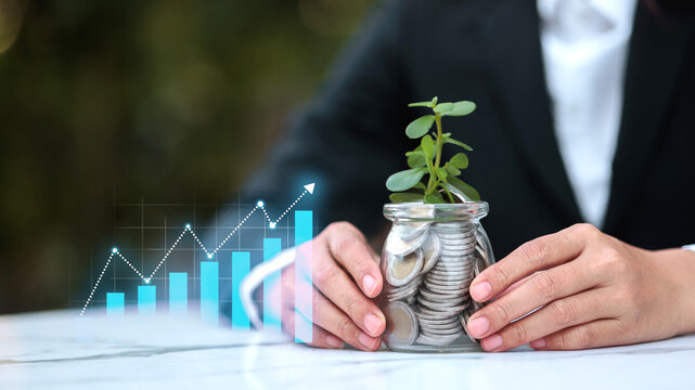 Sustainable investment growth with coin savings, young plant in glass jar, financial planning, green finance, ESG strategy and wealth management