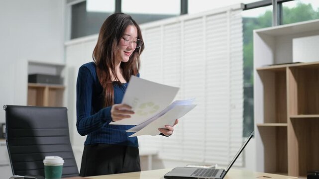 Asian lawyer consults with a client in a modern law office, discussing contracts, legal strategy, business compliance and corporate advisory during a professional meeting.