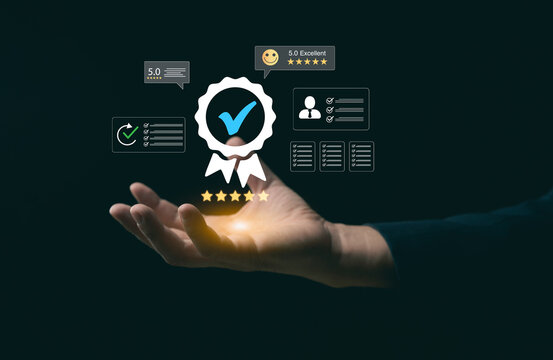 Businessman holding glowing quality assurance badge with five stars rating icons, concept of customer satisfaction and guarantee standard product.