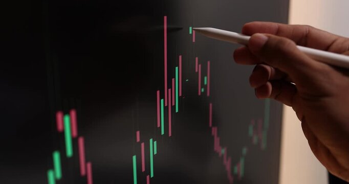 Professional trader analyzes live financial charts across desktop, laptop, tablet, and smartphone in a modern office, monitoring market trends, tracking investments, and making trading decisions.