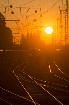 Sunset over railway track near main station in Munich Germany