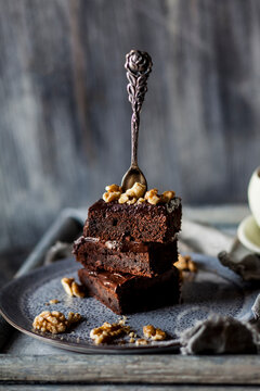 Stack of homemade gluten free brownies with chocolate and coffee glazing