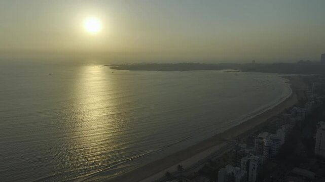  sunset above Versova coastline and high rise buildings Mumbai,
Drone shot of Versova Beach with Arabian Sea and city skyline
