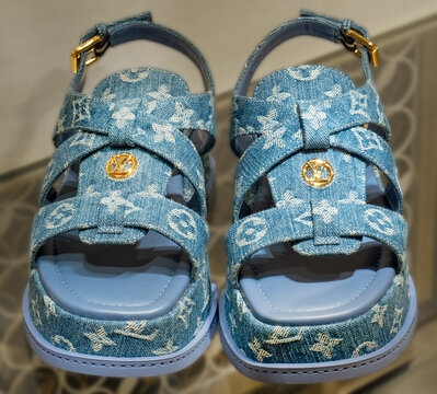 Blue denim sandals with a platform sole featuring the Monogram pattern and the LV logo by Louis Vuitton.Milan - Italy,04 July 2026
