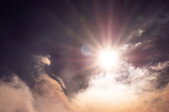Sky background and shining sun. Extreme weather and heat wave concept. Global warming effects