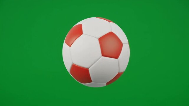 Red and White Soccer Ball on Green Background
