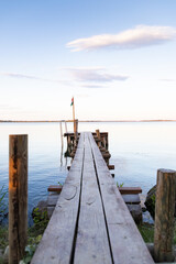 Fototapeta premium wooden pier on a lake serene summer
