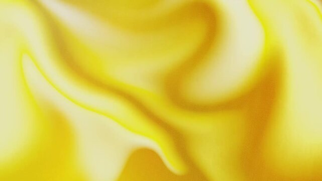 Abstract fluid swirls in bright gold create a luxurious and soft texture pattern. Ideal for elegant branding and highend designs.