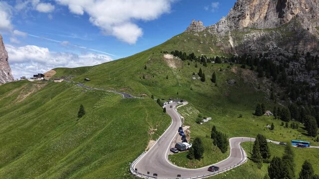 Aerial Drone View of Switchback Mountain Road with Cars and Bus, Dolomite Alpine Pass South Tyrol Italy Scenic Route