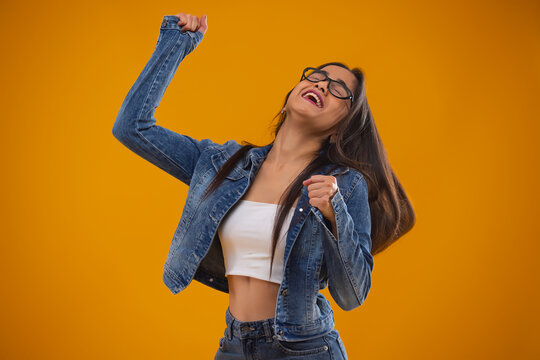 Young girl having fun in front of camera