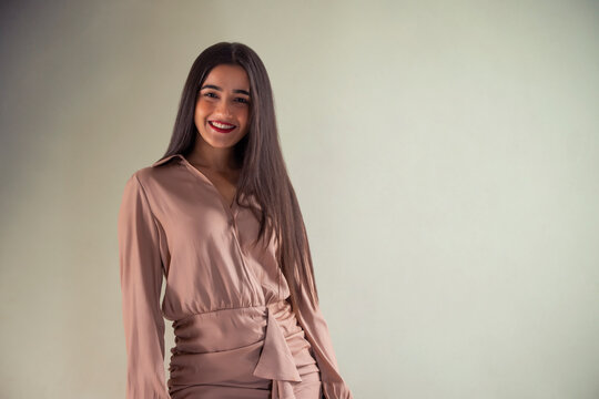 Portrait of a beautiful young model posing in front of camera