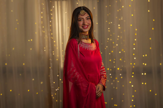 Young girl standing and facing camera with smile