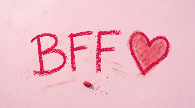 Minimal BFF message with hand drawn heart on soft pink background, expressing friendship, everlasting connection, kindness, loyalty, companionship, affection and cherished memories.