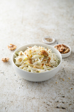 Cabbage salad with celery and walnut