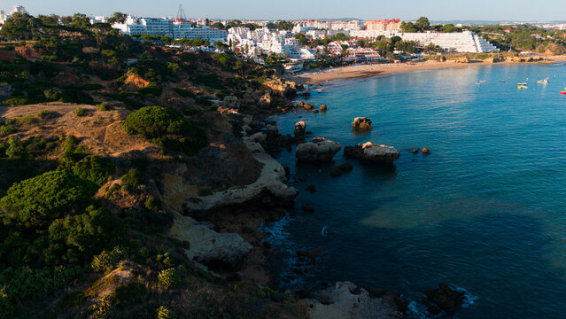 relaxed coastal town with scenic views of the sea and rock formations from an aerial perspective during vacation season in a serene and natural setting Praia dos Aveiros Portugal