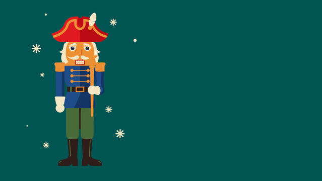 A toy nutcracker soldier stands on a green background with stars