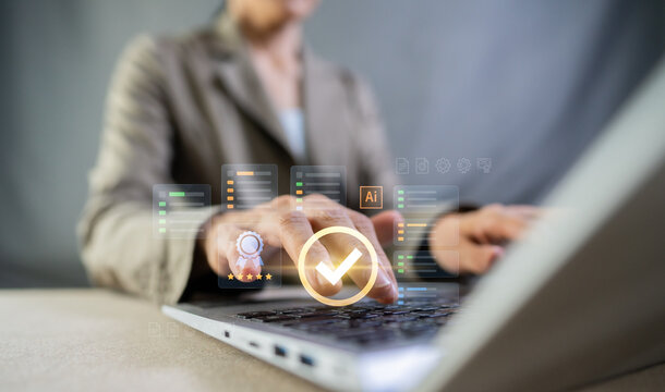 Businesswoman using AI to check quality control, standard evaluation, and virtual checklist on laptop.