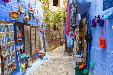 Fototapeta premium Traditional souvenir and gifts market street in blue town Chefchaouen in Moroccow