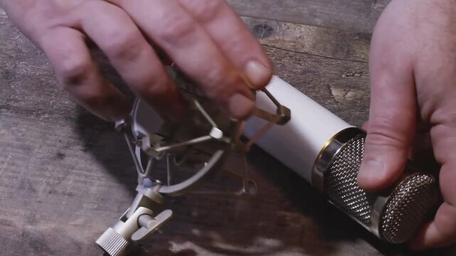 Setup of a studio microphone with an anti vibration attachment for recording sound