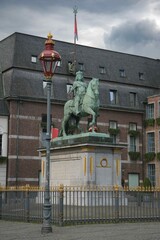Fototapeta premium Monument of Jan Wellem in Dusseldorf with equestrian statue and historic buildings