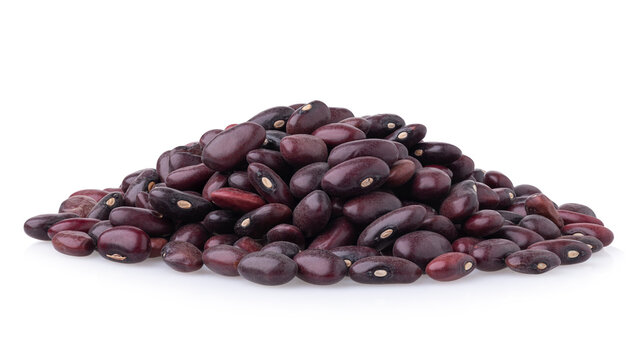 Pile of dry red kidney beans dark maroon isolated on white background side view