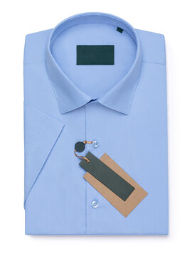 Folded mens short sleeve shirt blue with tags isolated on white background top view