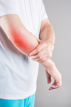 Diseases of the elbow joint, bone fracture and inflammation, man suffering from pain in cubit