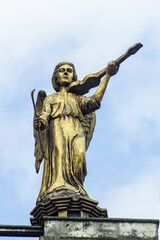 Obraz premium Statues of saints and angels in the church
