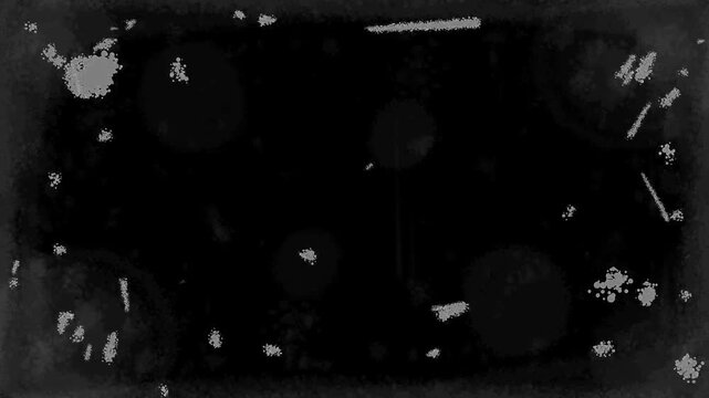 Gray grainy spots on a black background. Texture of a cracked plastic surface. Retro dirt overlay effect in Full HD.