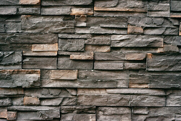 Fototapeta premium Natural Stacked Stone Wall Texture Background for Construction Design