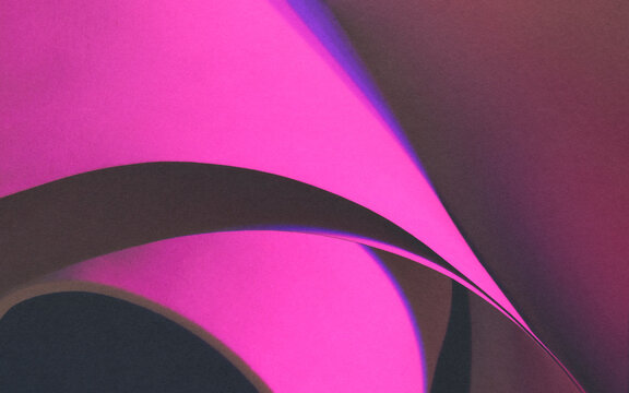 Close-up of curvilinear elements illuminated with pink light, paper texture background, studio shot photo