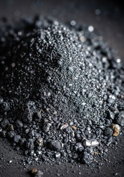 Industrial sediment and grey ash residue from a furnace burner, showing textures of soot and various metallic combustion waste particles, environment, waste, industrial