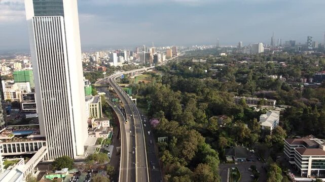 Aerial drone view of Westlands, Nairobi Expressway, GTC Tower and Nairobi CBD, Kenya