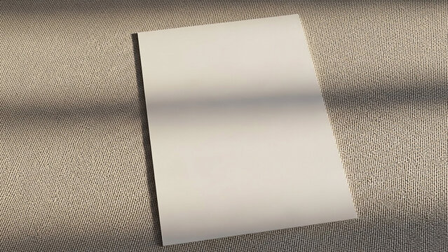 Blank White Paper on Textured Fabric Surface
