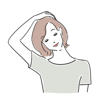 肩凝りのセルフケアをする大人の女性
