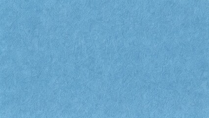 Naklejka premium Blue recycled craft paper texture with natural cardboard fibers, blank eco-friendly background featuring subtle grain and realistic details, for packaging, branding, stationery and creative design