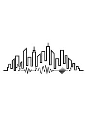 Obraz premium A cityscape designed to look like a sound wave equalizer