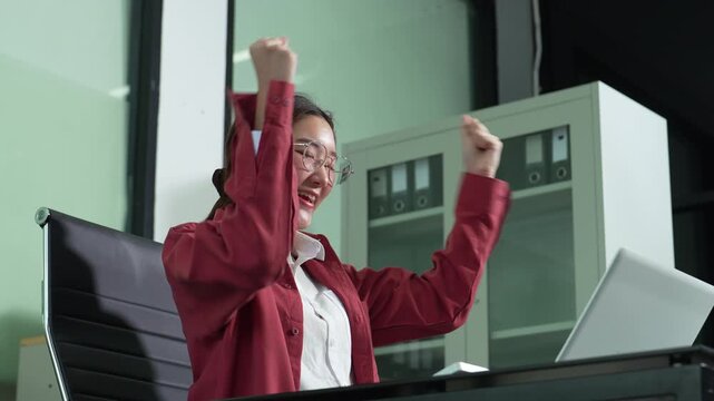 Overjoyed asian excited woman, happy smiling, getting bonus money.