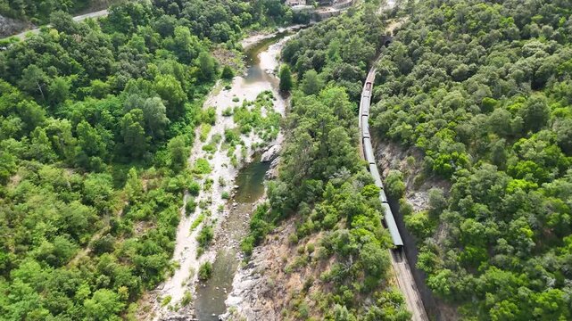Aerial View of Historic Steam Train Through the C&eacute;vennes Forest near Anduze, France