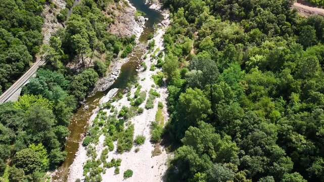 Aerial View of Historic Railway Bridge Crossing the Gardon River in Anduze, France