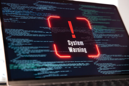 System warning on a computer screen, data, code, encryption, computer crime. Spyware, data breach, computer virus, hacker, communication problems, computer language, security, firewall.