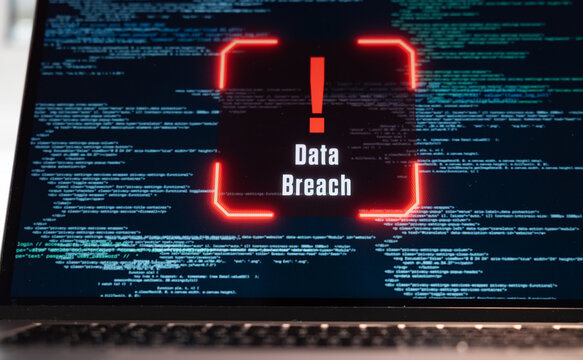 Data breach warning sign on a computer screen, data, code, computer crime, encryption. System hacked, spyware, hacker, communication problems, computer language, security, firewall.
