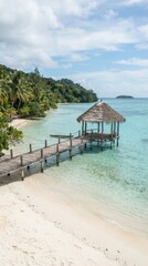 Fototapeta premium Wooden pier with thatched pavilion on a tropical beach
