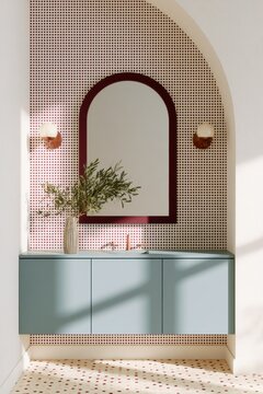 Bathroom vanity with dusty blue flat front floating cabinetry, arched mirror, wall sconces, and patterned wall in a modern interior design setting