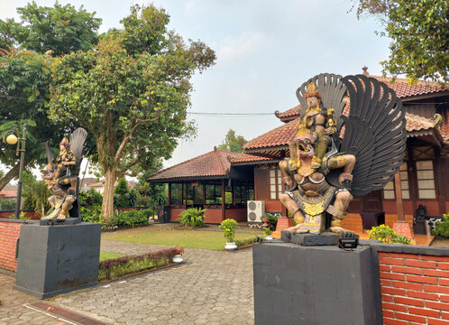 Traditional Javanese House with Garuda Statues